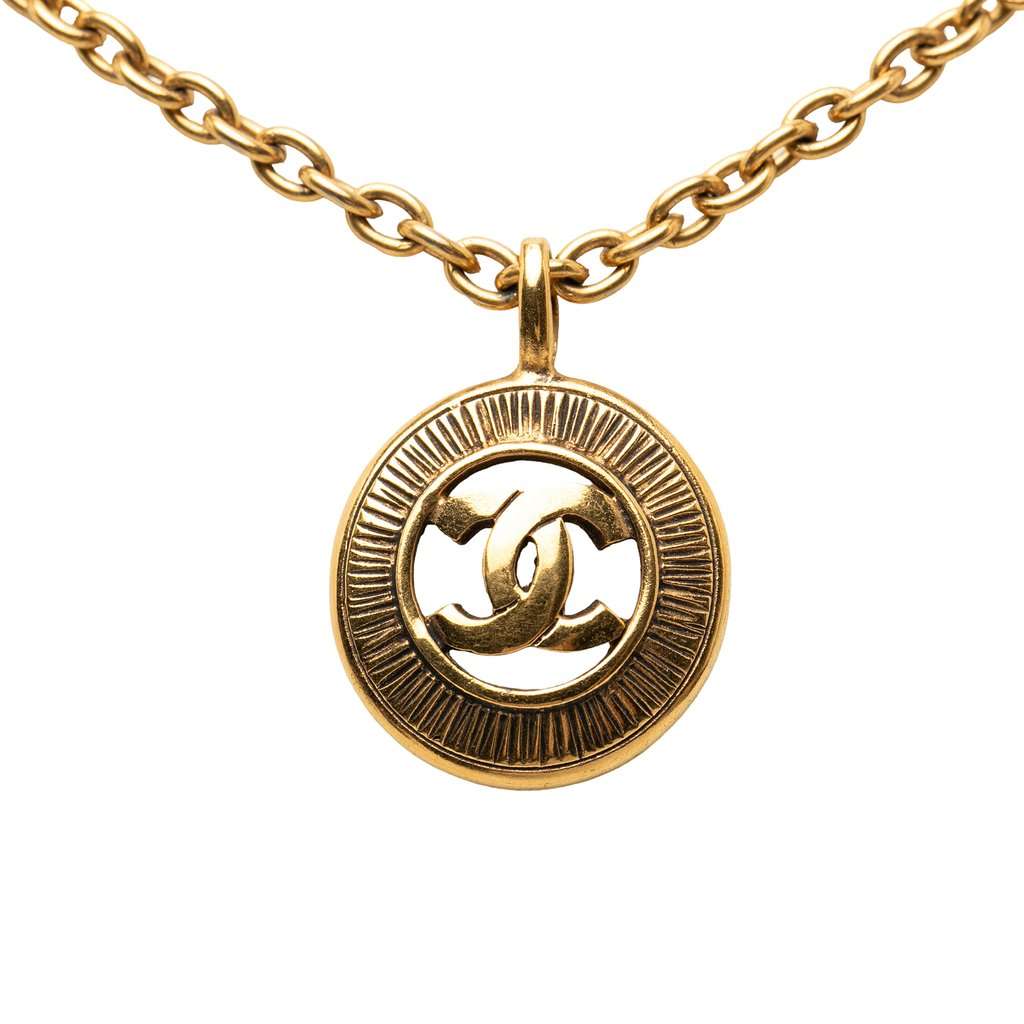 Chanel CC Gold Plated Sunburst Medallion Pendant Necklace Gold Metal Very good condition - Front View