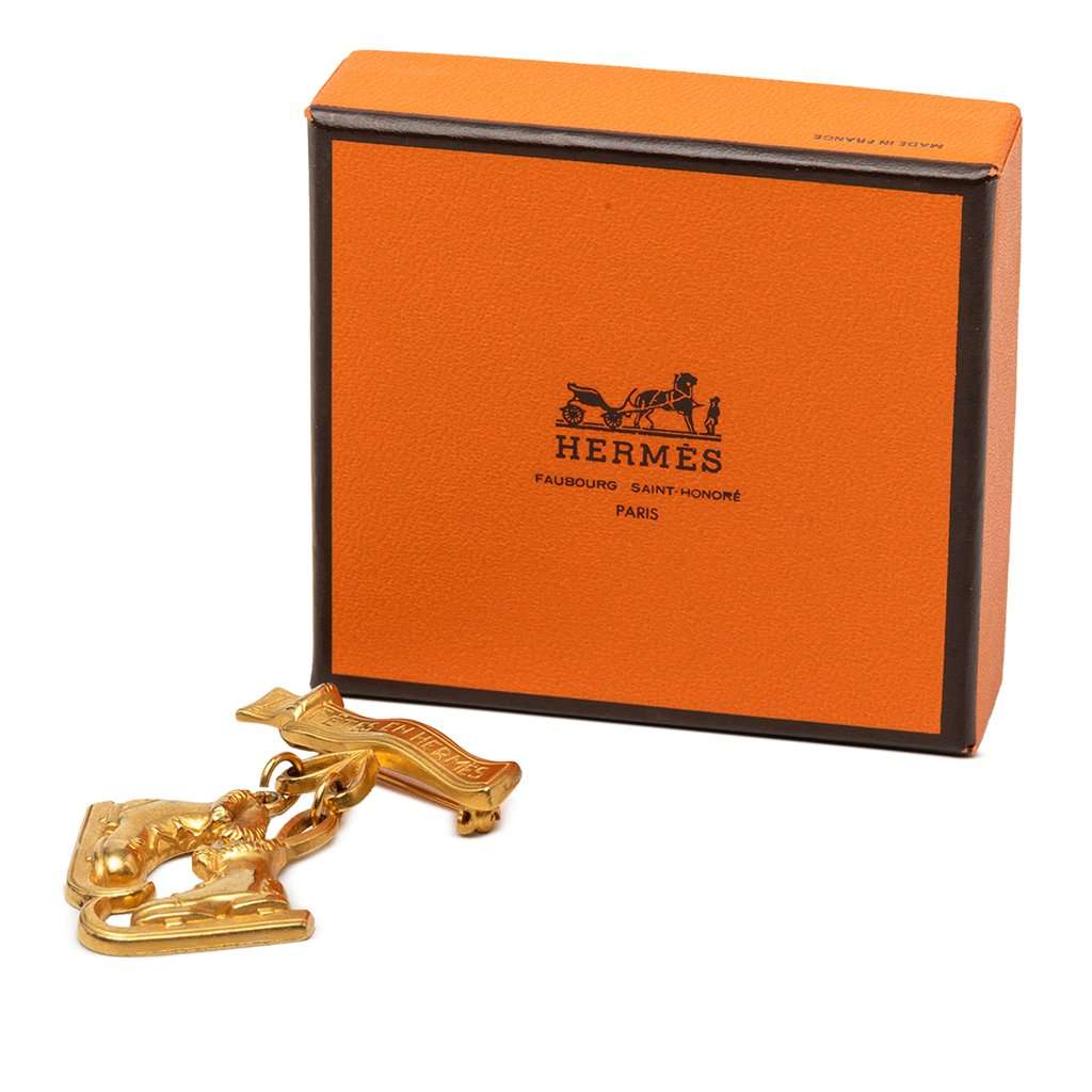 Hermès Gold Plated Les Fetes en Hermes Pin Brooch Gold Metal Very good - Model View