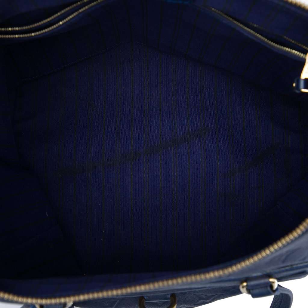 Louis Vuitton Monogram Empreinte Lumineuse PM Blue Leather Good - Model View