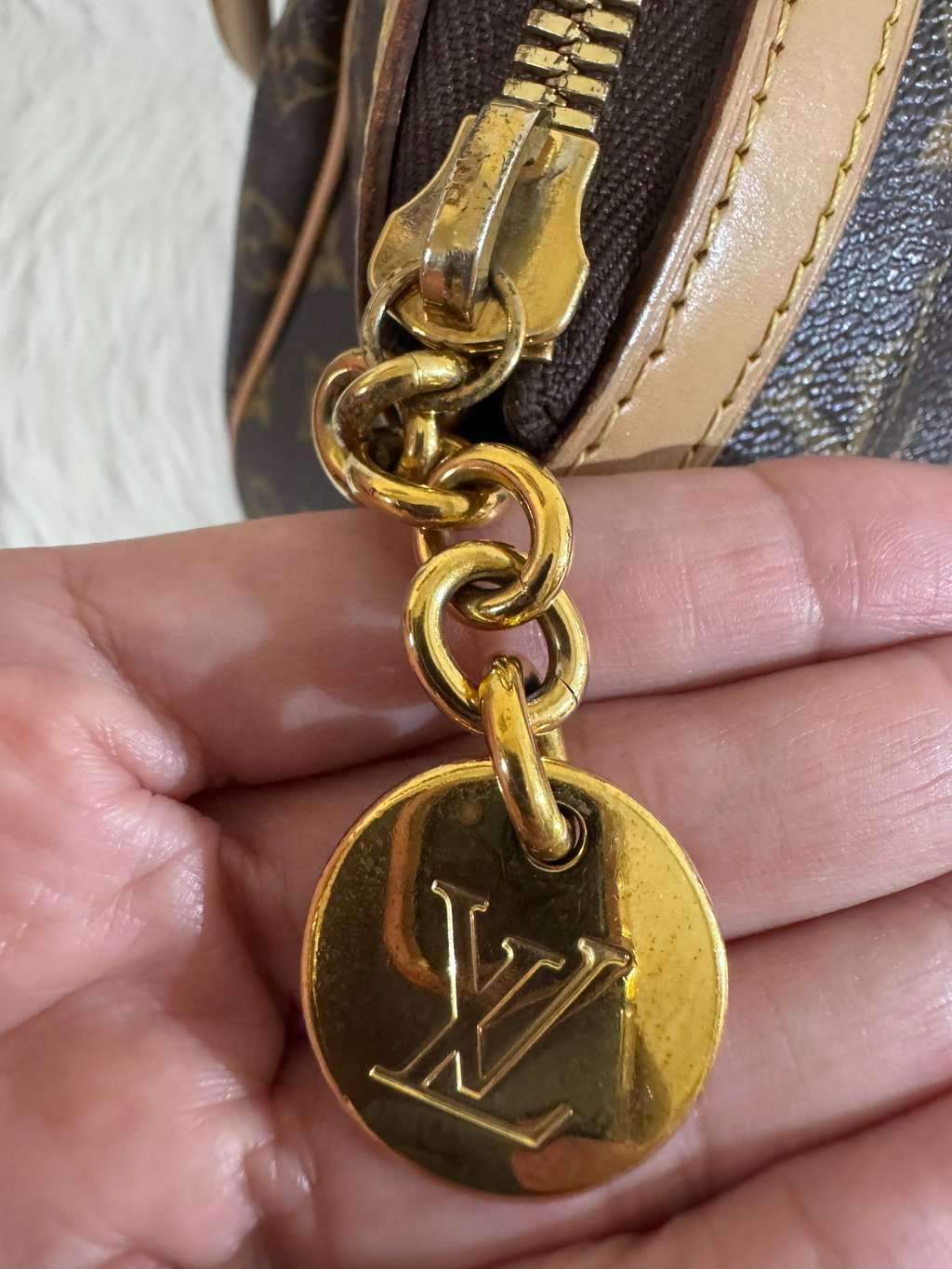 Louis Vuitton Monogram Tivoli GM Brown Canvas Good - Model View