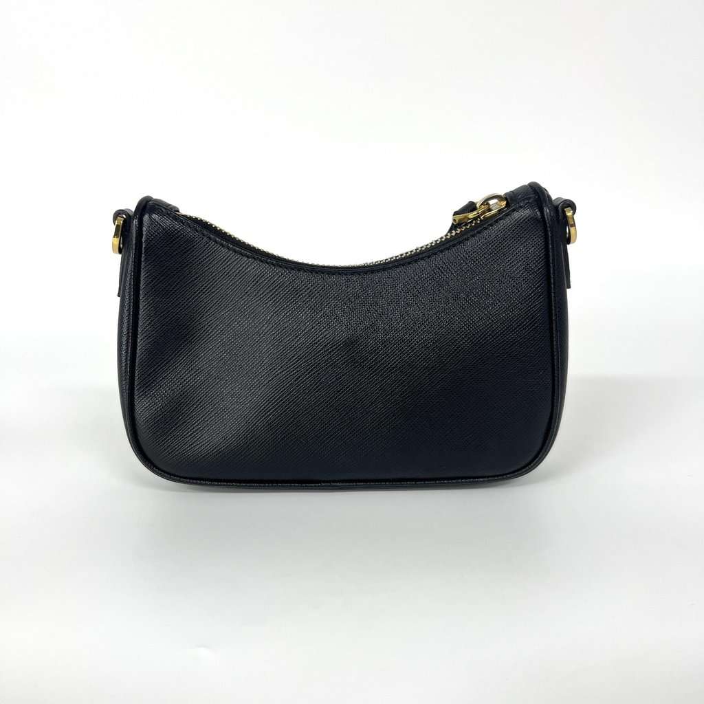 Prada Saffiano leather mini bag in black with gold hardware Black Leather Very good - Inside View