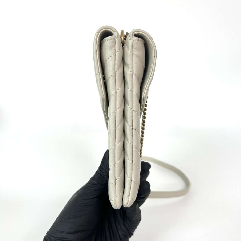 Saint Laurent Monogram Matelassé Phone Holder Shoulder Bag Blanc Vintage Gold Hardware Ecru Leather Good - Model View