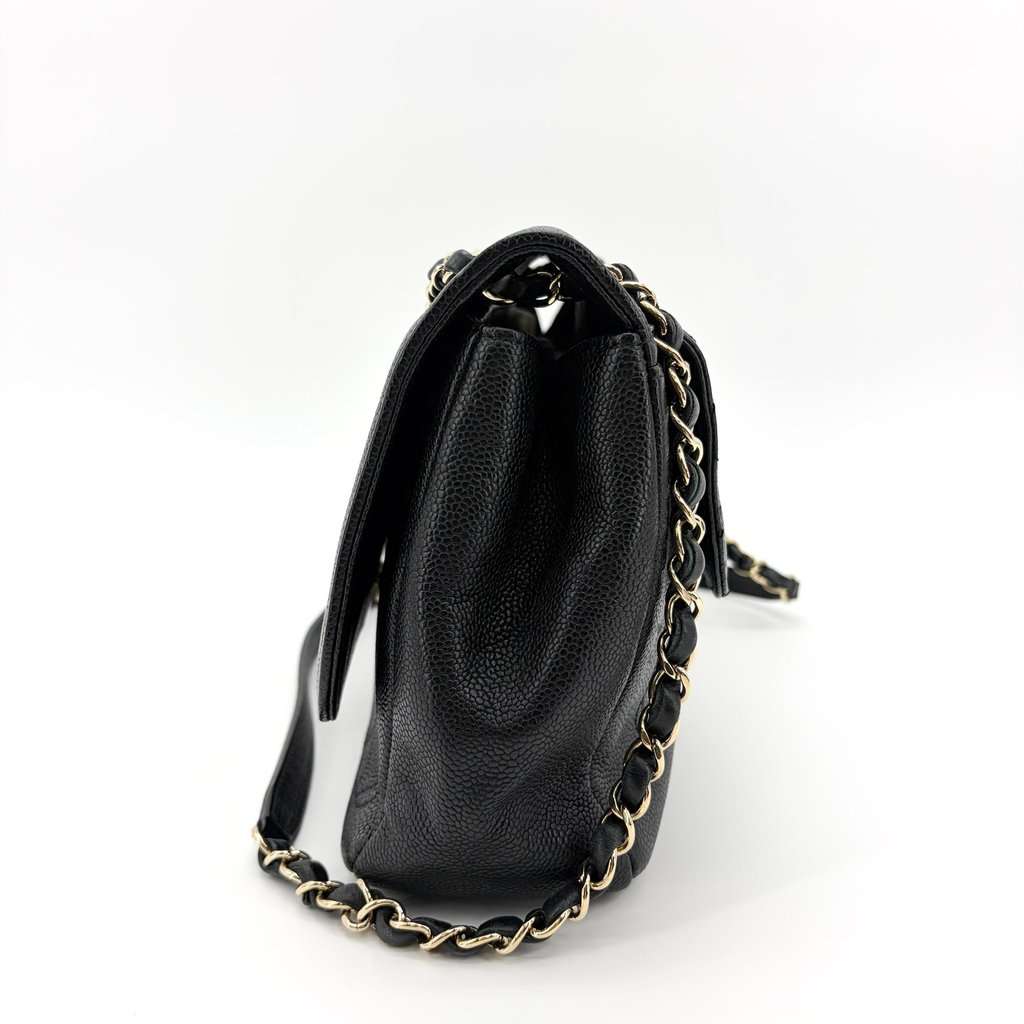 Chanel Large Caviar Quilted CC Flap Bag Black Gold Hardware Black Leather Very good - Model View