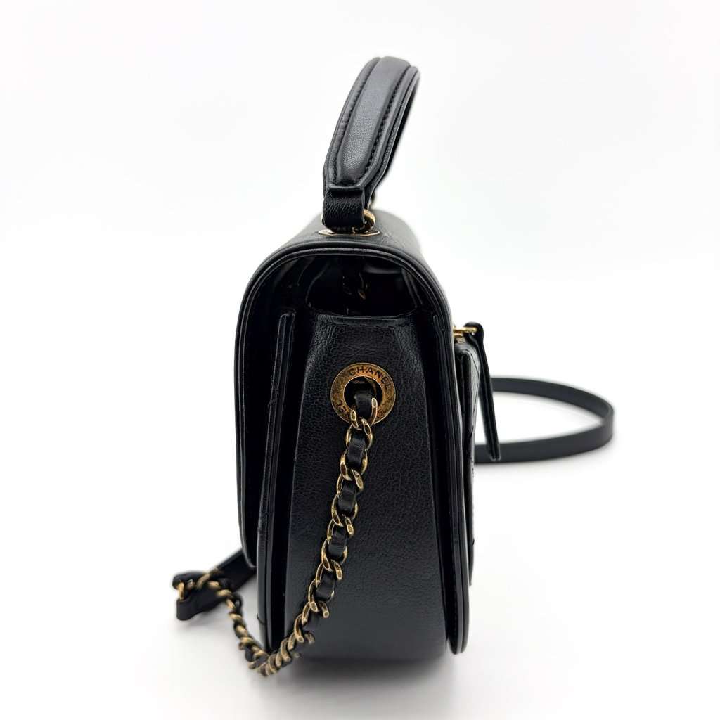 Chanel Lambskin Round Flap Top Handle Bag Black Gold Hardware Black Leather Good - Model View