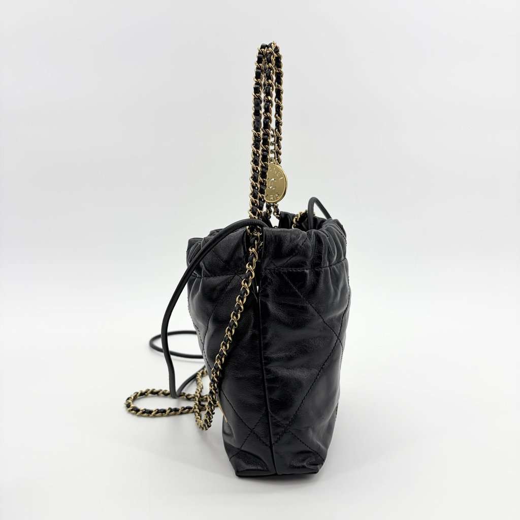 Chanel 22 Mini Handbag Black Glossy Calfskin Gold Hardware Black Leather Very good - Model View