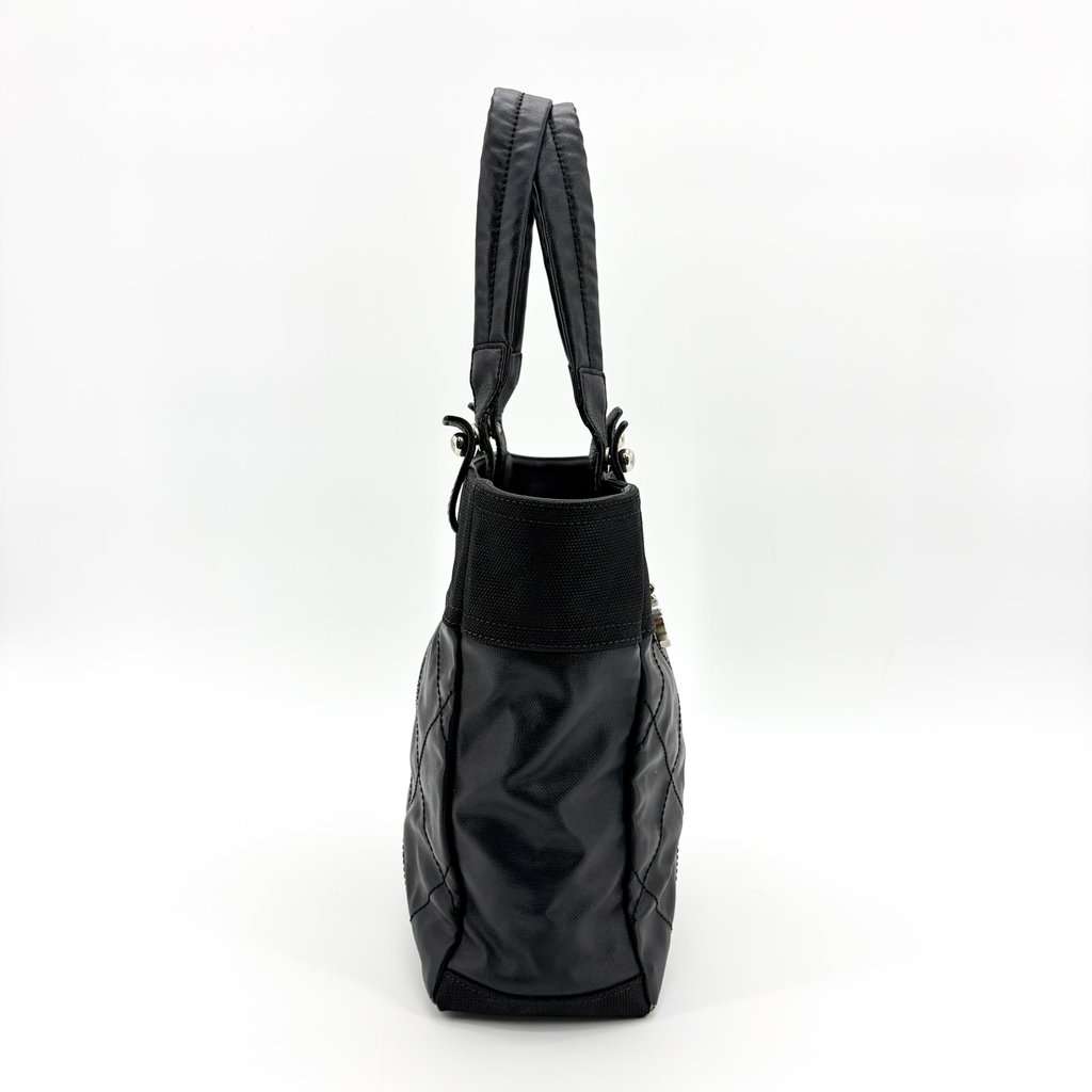 Chanel Paris Biarritz Tote Bag PM Black Black Canvas Fair - Model View