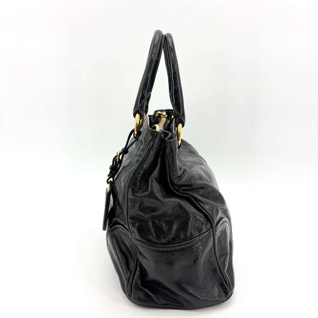 Prada Vitello Shine Tote Bag Black with Gold Hardware Black Leather Good - Model View