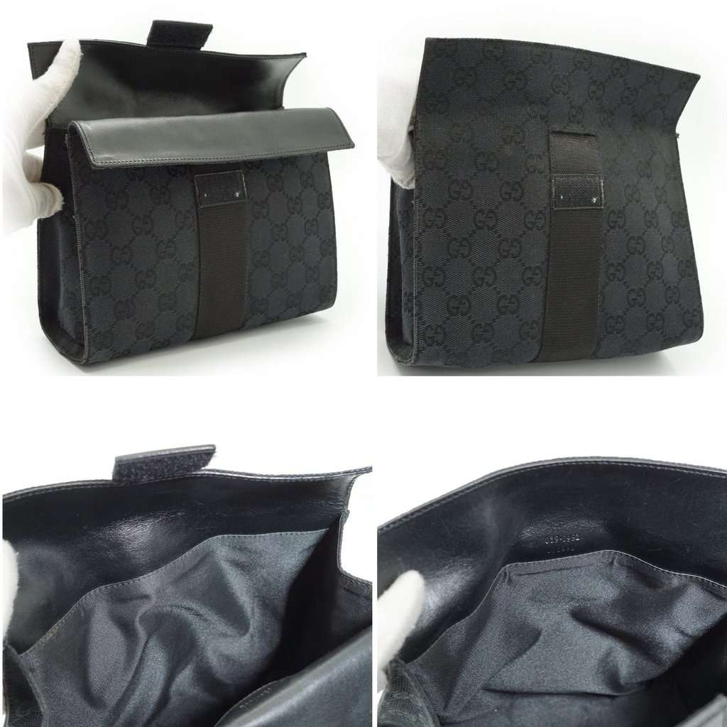 Gucci Clutch Bag Monogram Black Canvas Good - Model View