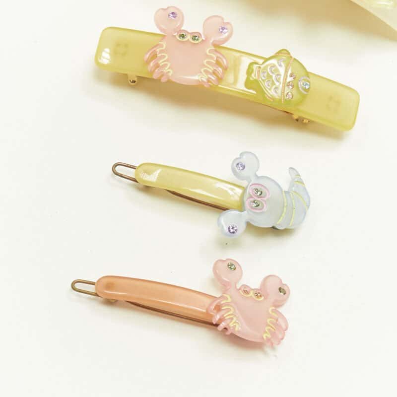 Unsigned Mermaid Hair Clips Yellow Plastic Very good condition - Model View