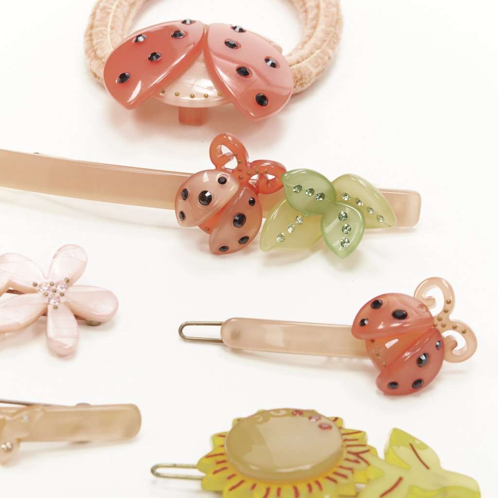 Unsigned Beetle Hair Clips Pink Plastic Very good condition - Box View