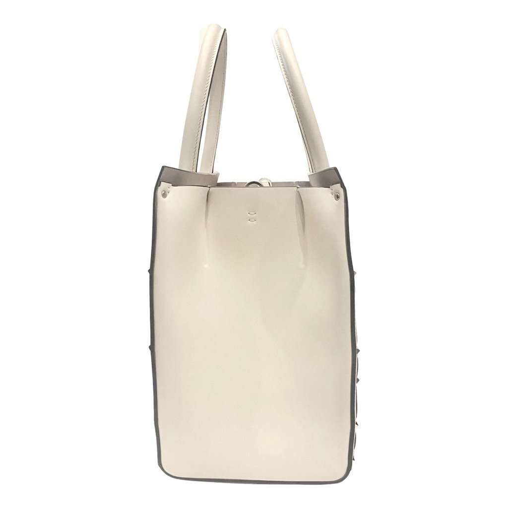 Valentino Garavani Valentino Garavani Beehive Lattice Ivory Studded Leather Crossbody Tote White Leather Never worn - Model View