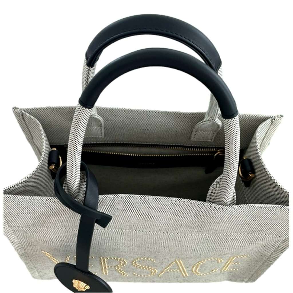 Versace Versace Studded Logo Mini Tote Ecru Canvas Crossbody Bag Gold Hardware Silver Leather Never worn - Model View