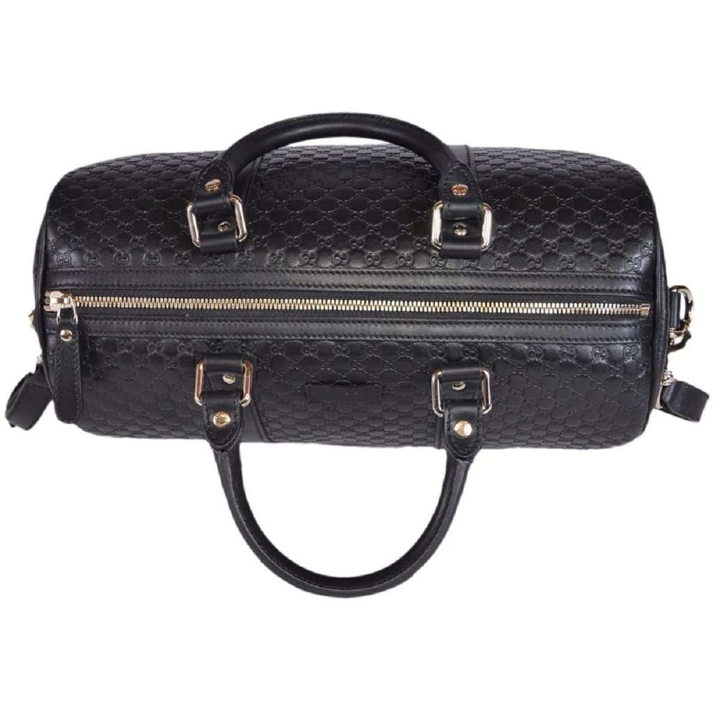 Gucci Gucci Microguccissima GG Boston Bag Black Embossed Leather Gold Hardware Black Leather Never worn - Model View