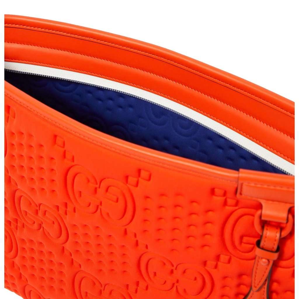 Gucci Gucci Off The Grid GG Embossed Orange Rubber Pouch Clutch Bag Orange Leather Never worn - Model View