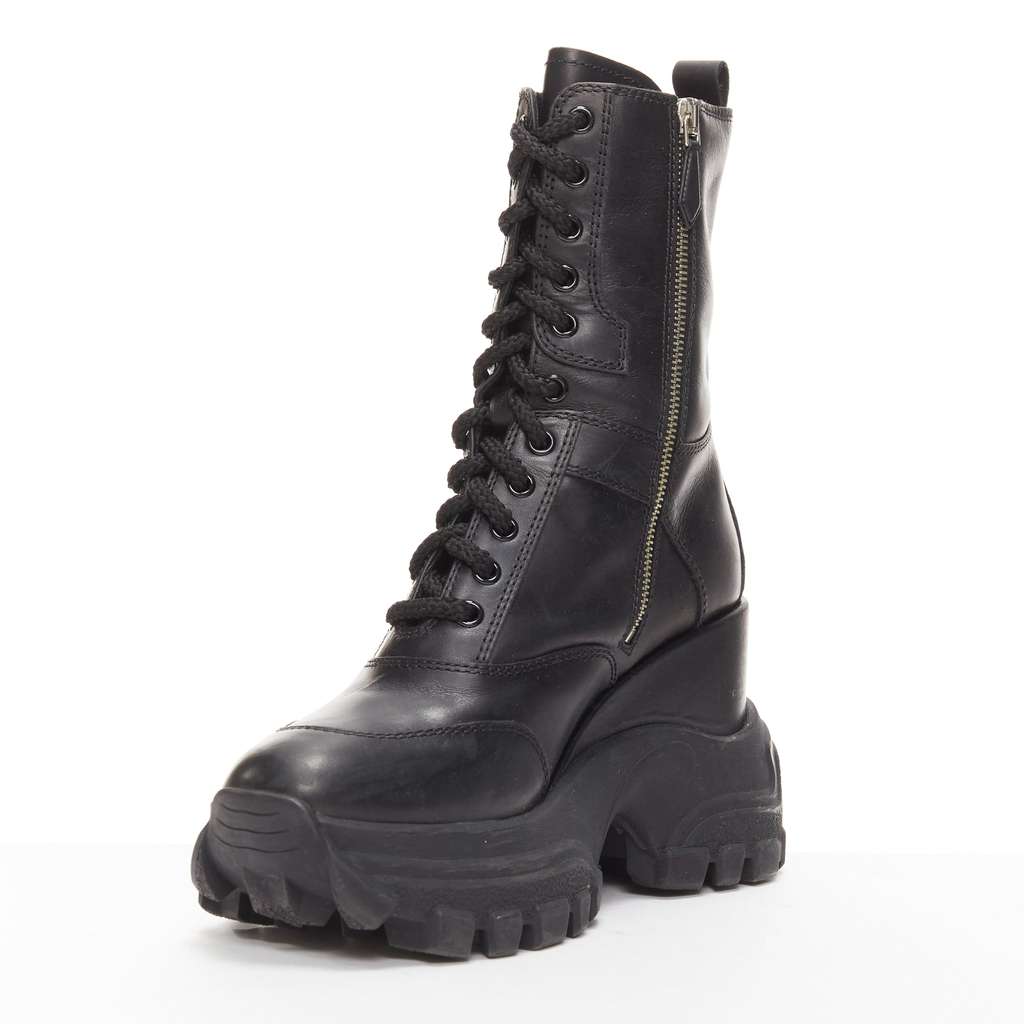 Miu Miu Monogram Tall Rain Boots Black Leather Good - Model View