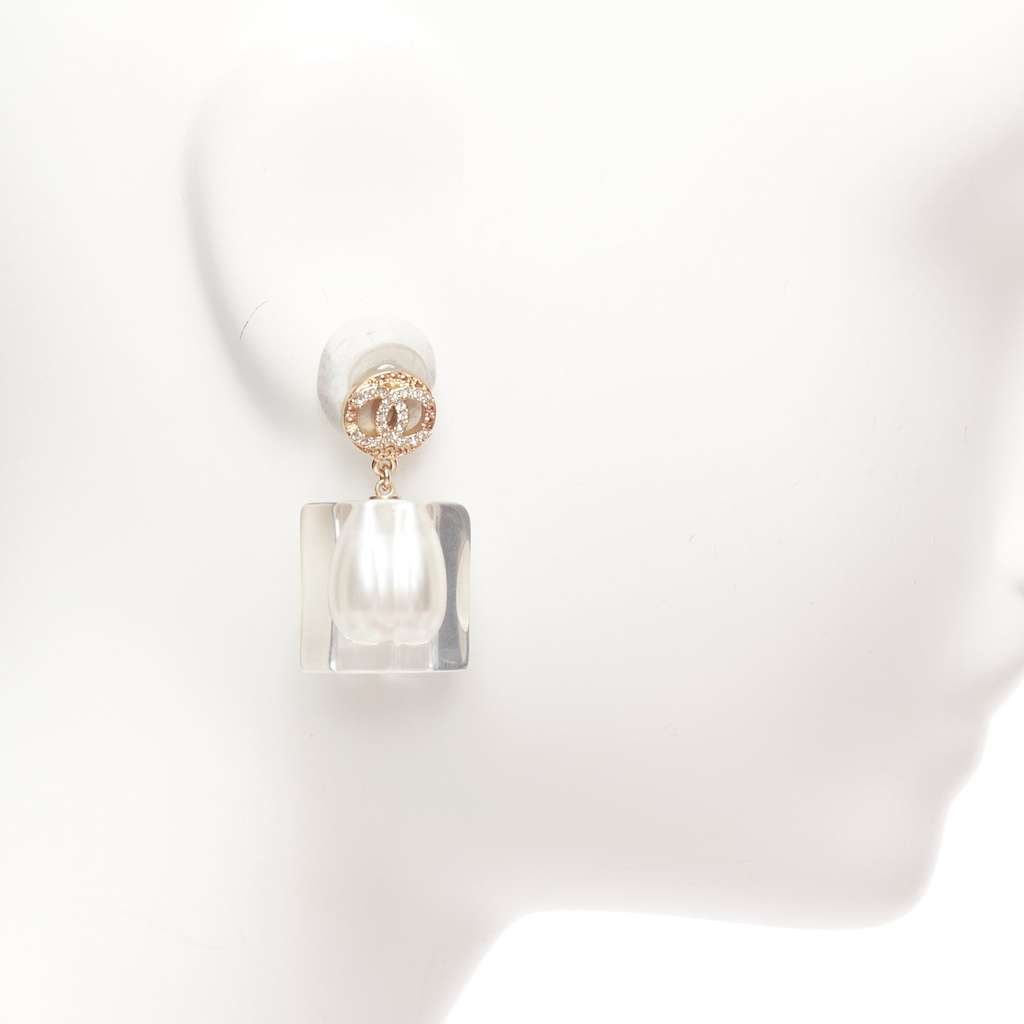 Chanel Encased Pearl Earrings White Pearl Never worn - Model View