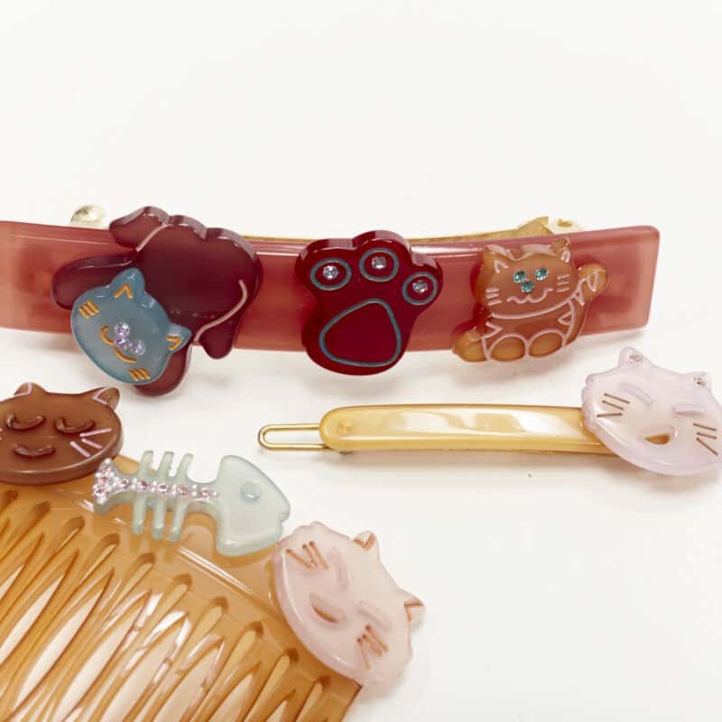 Unsigned Crystal Hair Comb Red Plastic Never worn - Model View