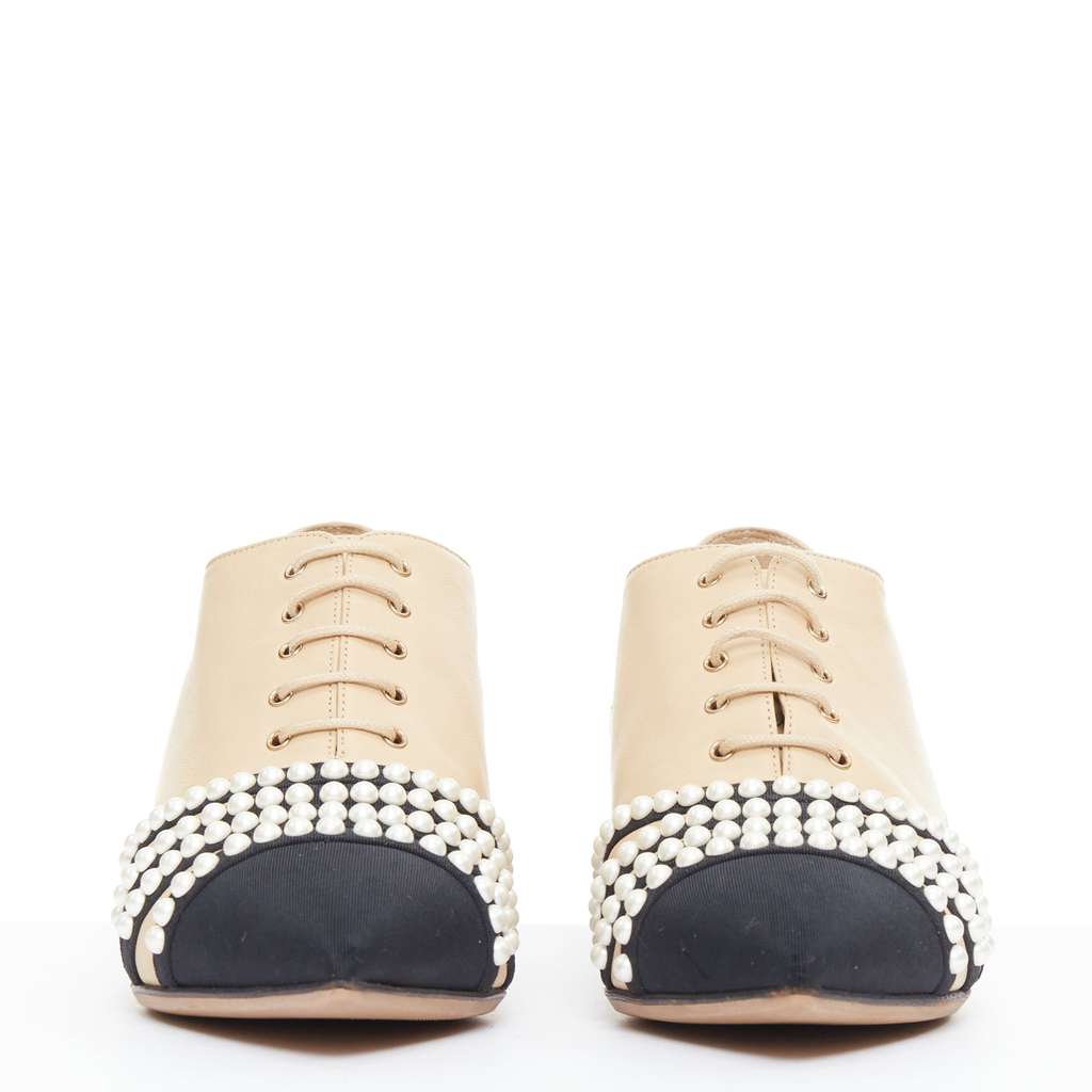 Chanel Pearl Cap Oxfords Beige Leather Fair - Model View