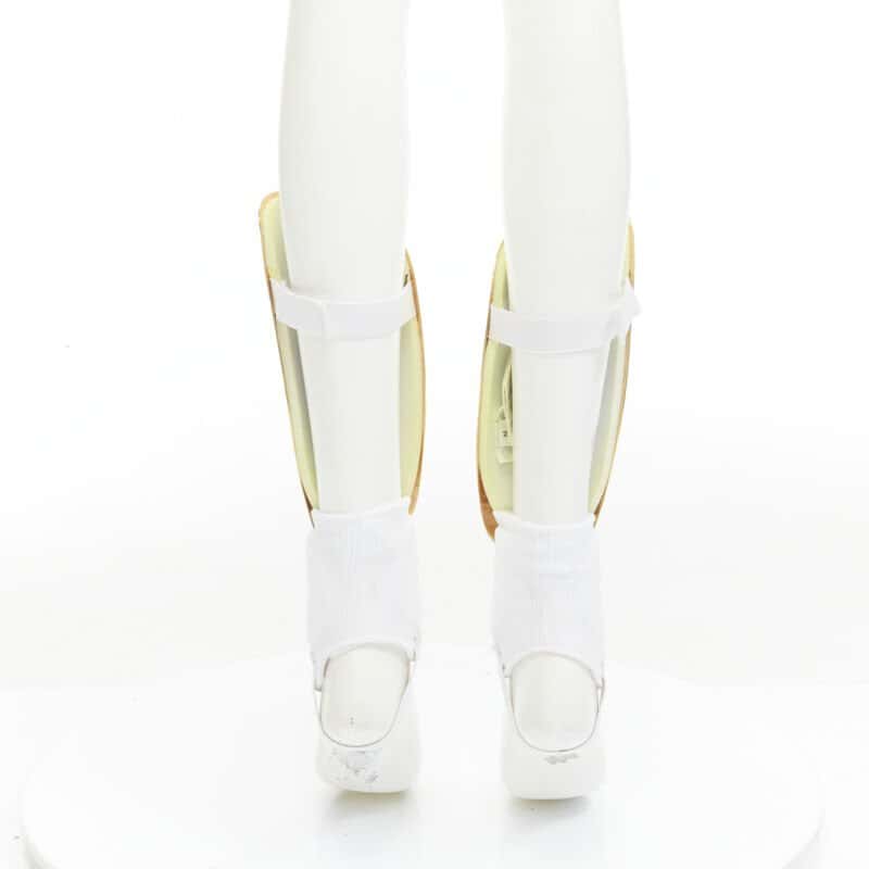 Gucci GG Shin Guards Gold Metal Fair - Box View