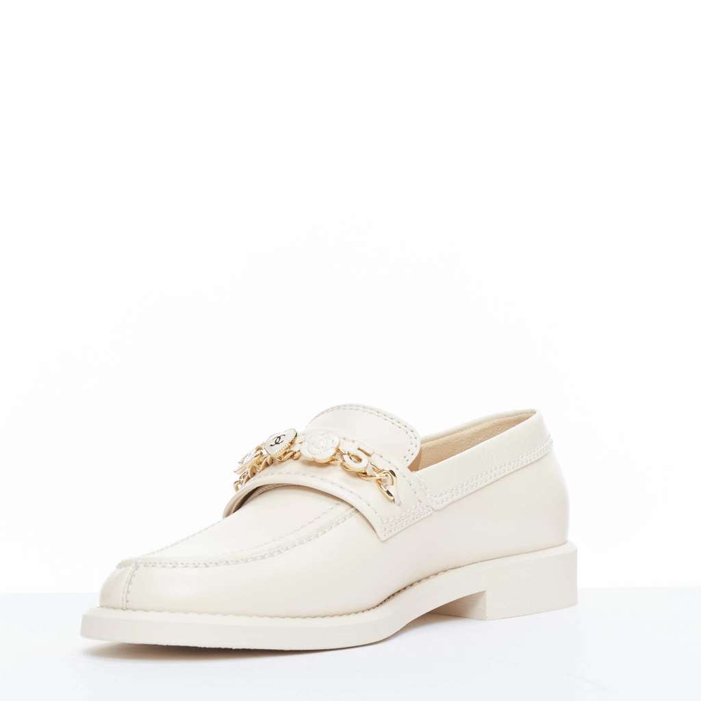 Chanel Heart Charm Loafers Beige Leather Never worn, with tag - Model View