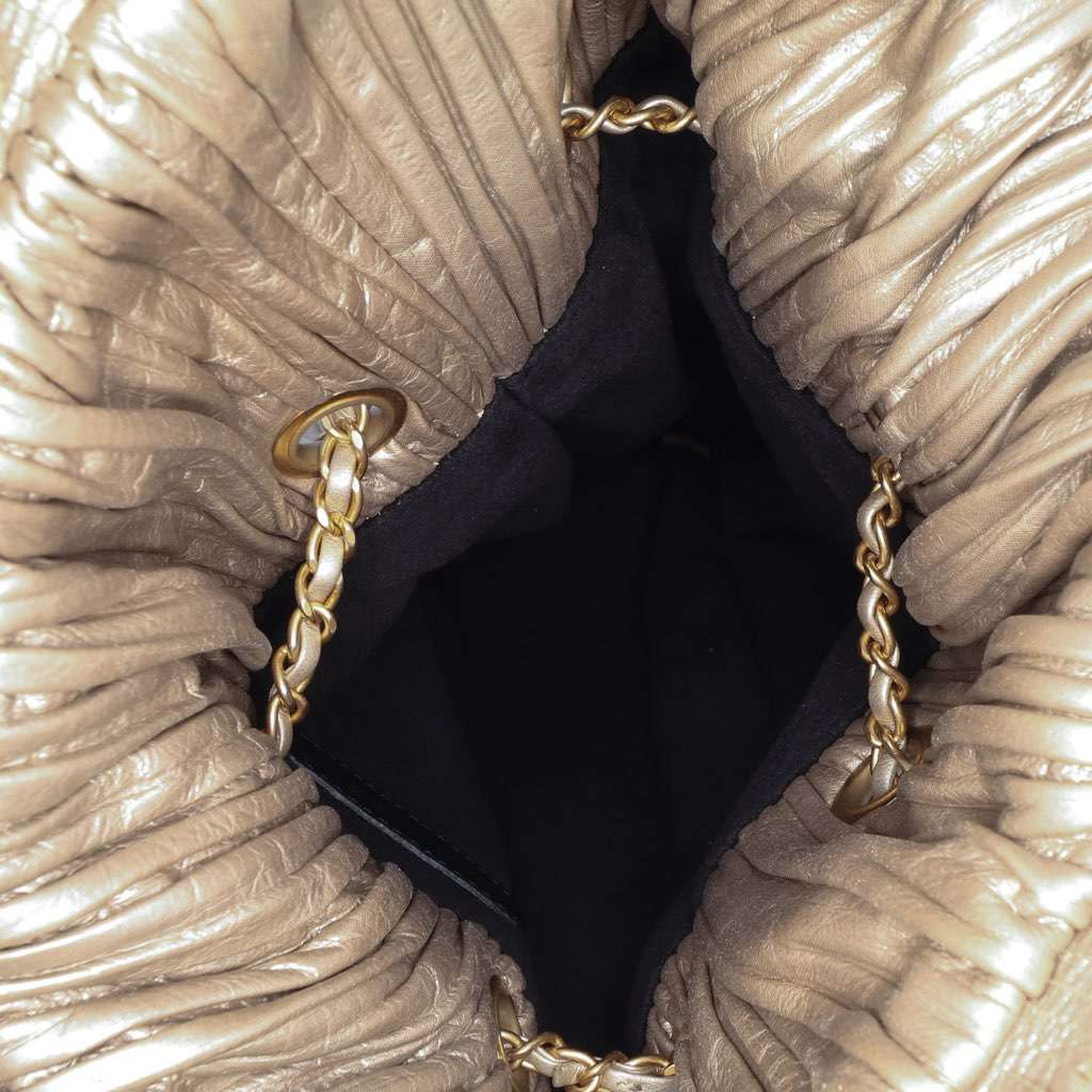 Chanel Medium Metallic Calfskin Coco Pleats Drawstring Backpack Gold Leather Very good - Model View