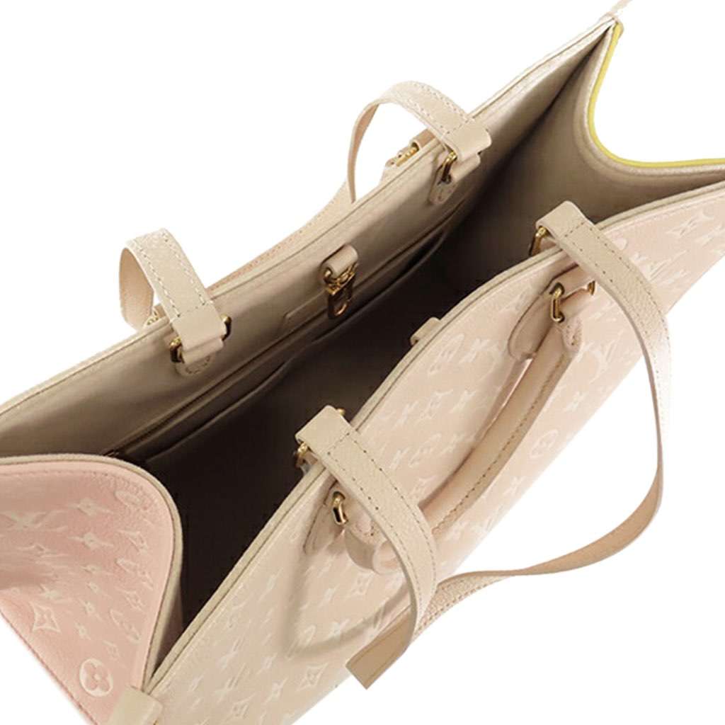 Louis Vuitton Monogram Empreinte Spring In The City Onthego MM Brown Leather Good - Model View