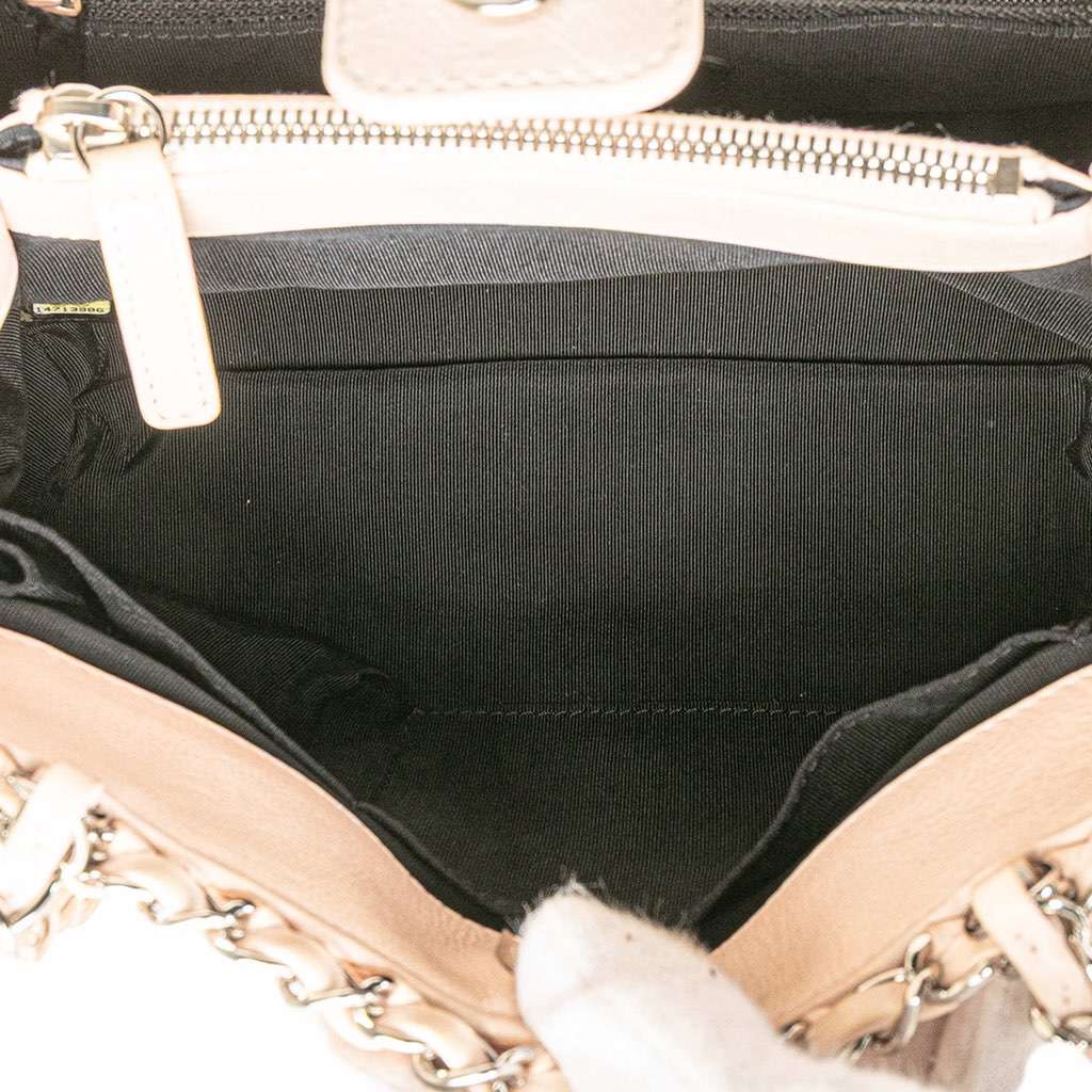 Chanel Mini Quilted Lambskin Chain Me Tote Brown Leather Good - Model View