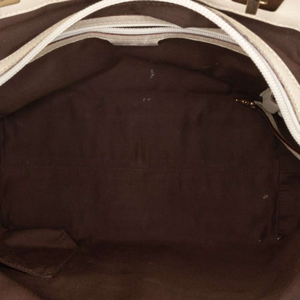 Gucci Small Guccissima Punch Tote Brown Leather Good - Model View