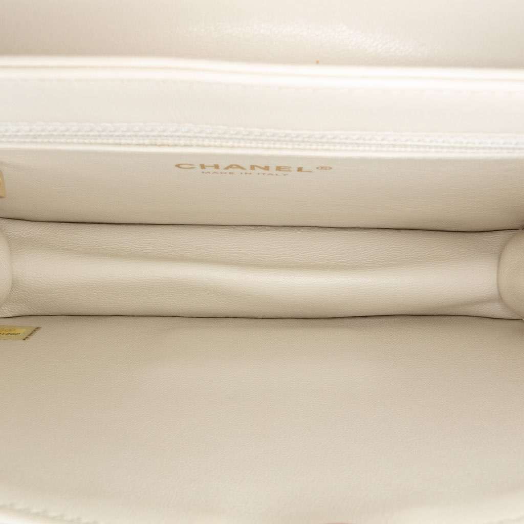 Chanel Mini Lambskin Beauty Lock Flap White Leather Good - Model View