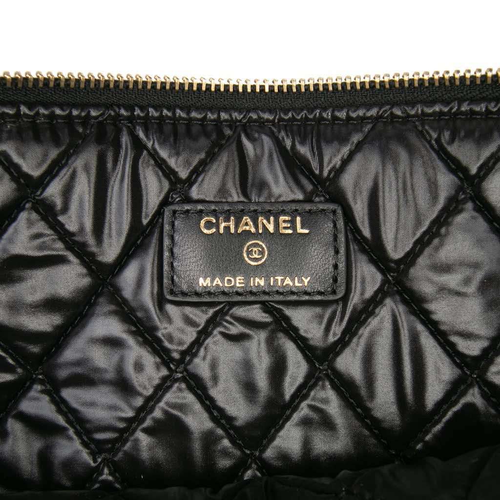 Chanel Large Quilted Lambskin Camellia O Case Clutch Black Leather Good - Box View