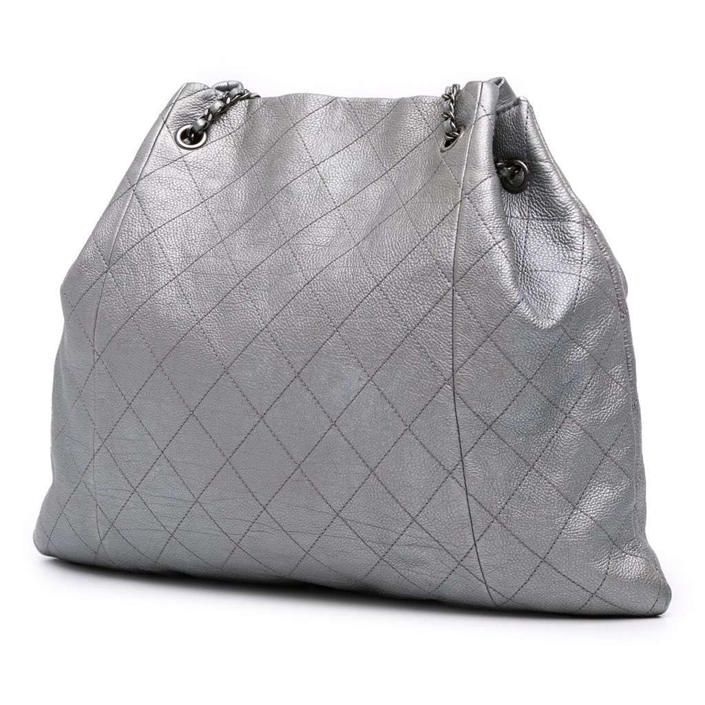 Chanel Metallic Quilted Calfskin Drawstring Bucket Bag Silver Leather Good - Back View