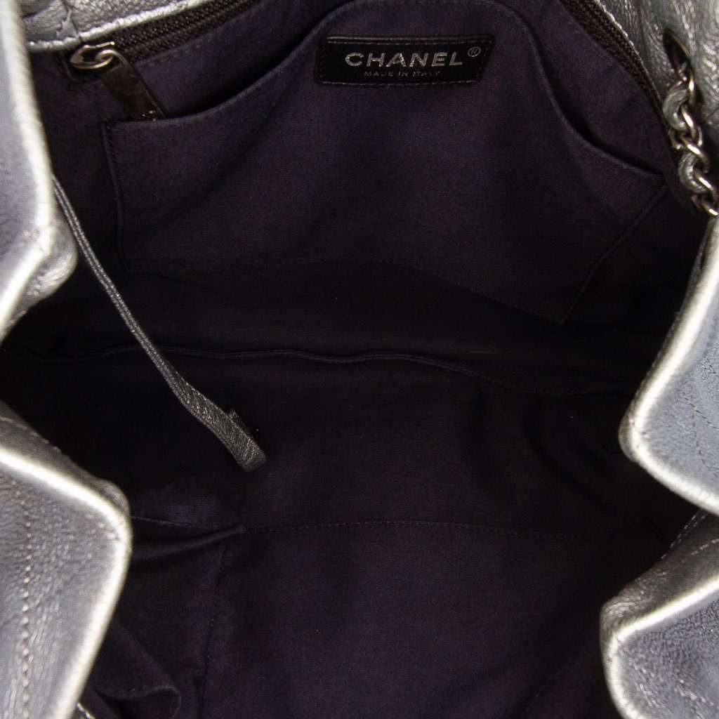 Chanel Metallic Quilted Calfskin Drawstring Bucket Bag Silver Leather Good - Model View