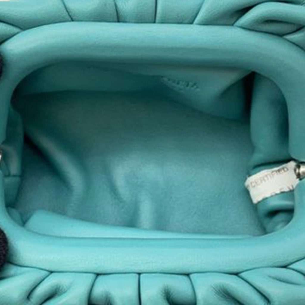 Bottega Veneta Lambskin The Extra Mini Pouch Crossbody Blue Leather Good - Model View