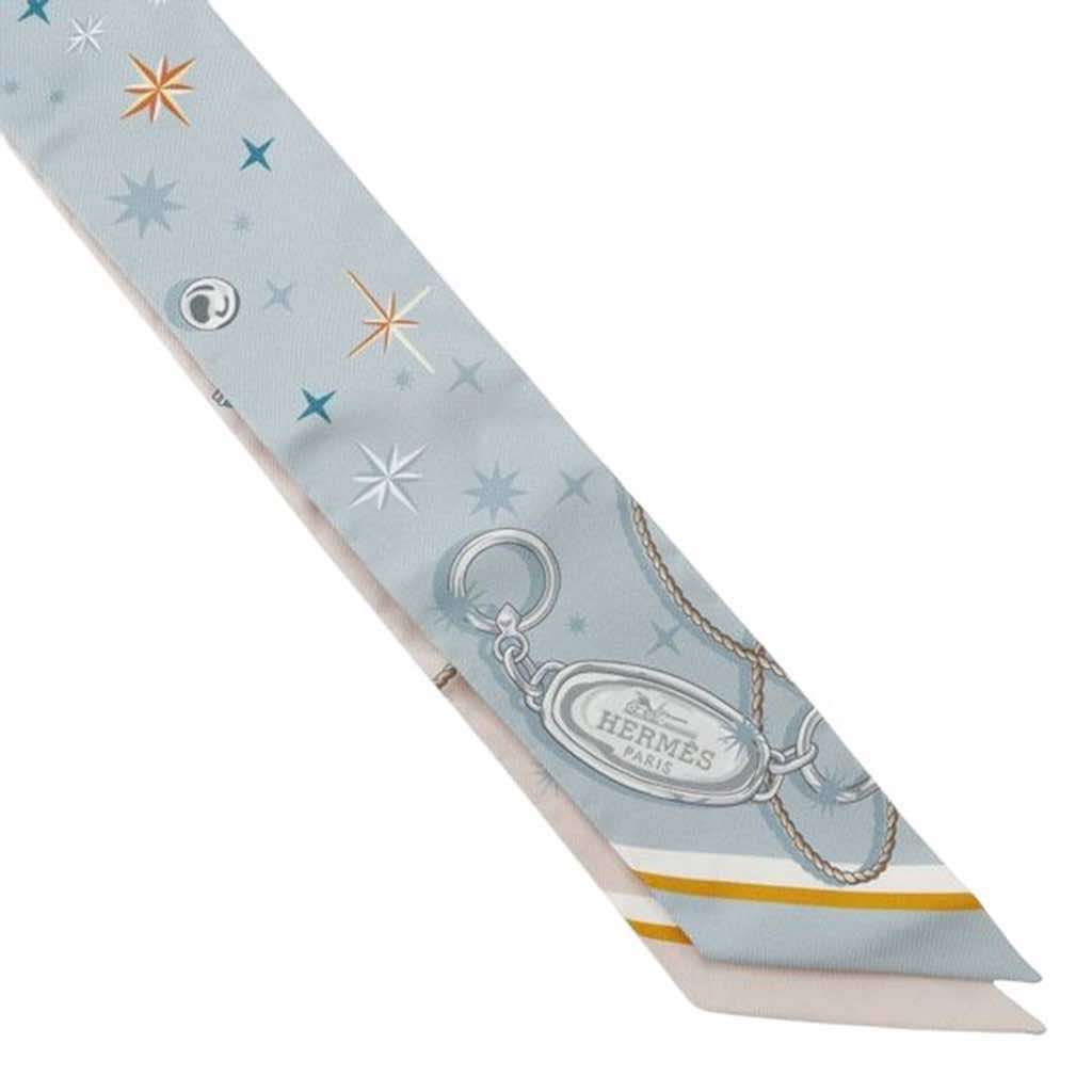 Hermès C est La Fete Silk Twilly Scarf Blue Silk Very good condition - Model View