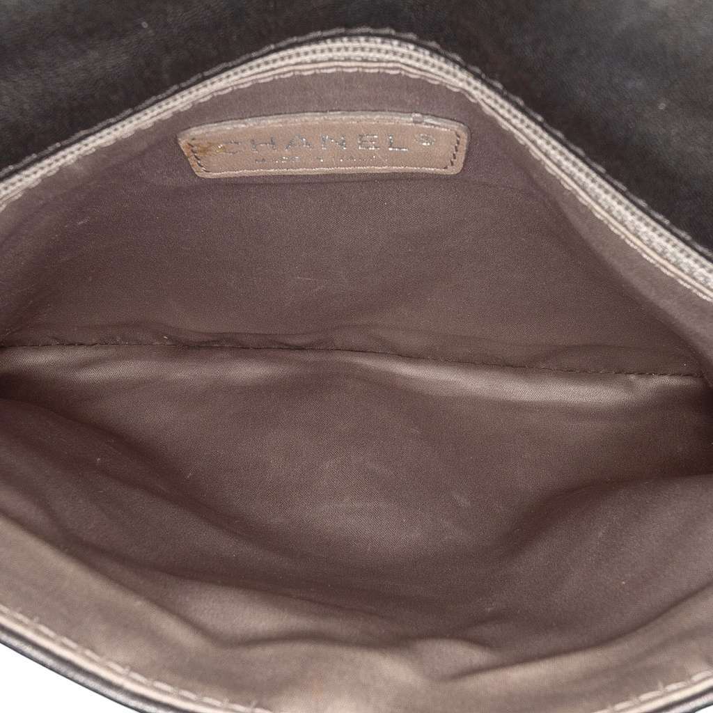 Chanel Quilted Metallic Distressed Lambskin CC Crystal Flap Black Leather Very good - Model View