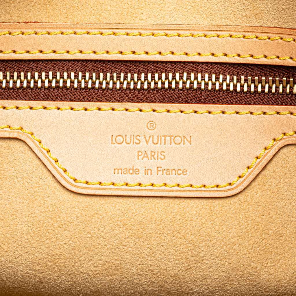 Louis Vuitton Nomade Petit Bucket Brown Leather Very good - Box View
