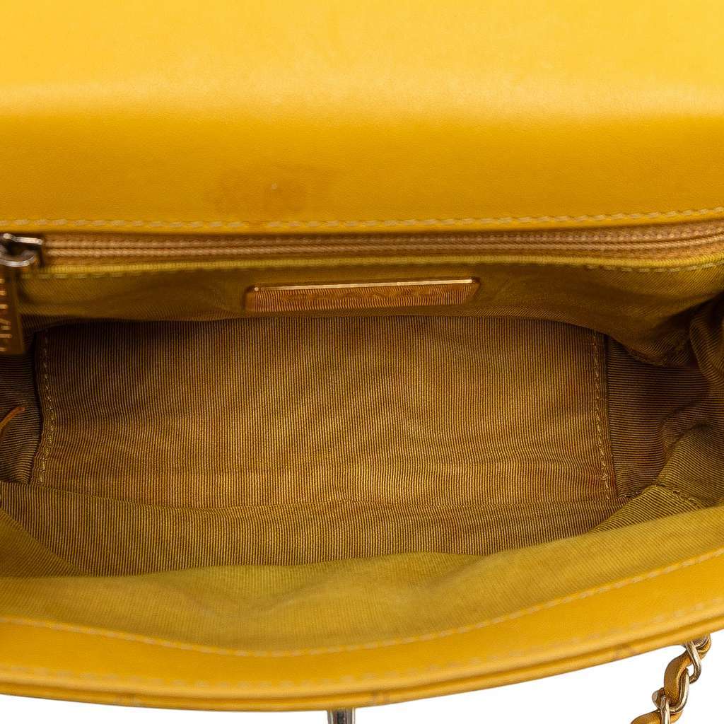 Chanel Small Quilted Lambskin Chain Infinity Top Handle Bag Yellow Leather Very good condition - Model View