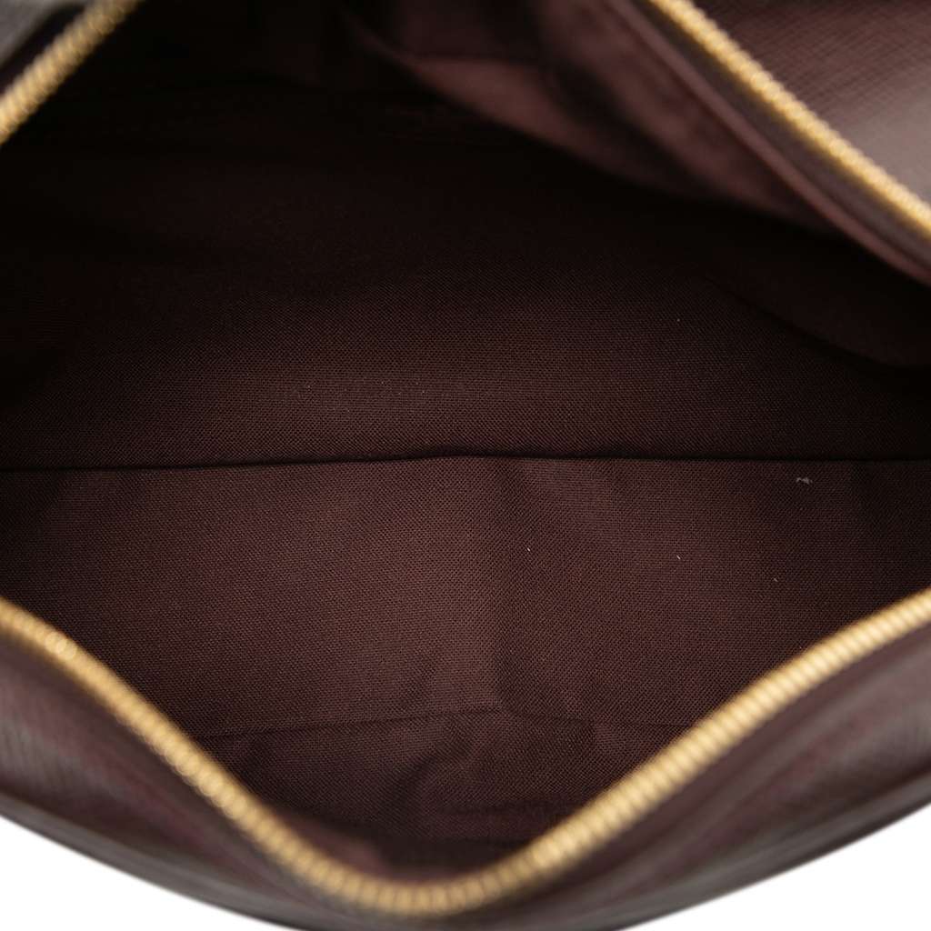 Louis Vuitton Taiga Reporter PM Brown Leather Good - Model View