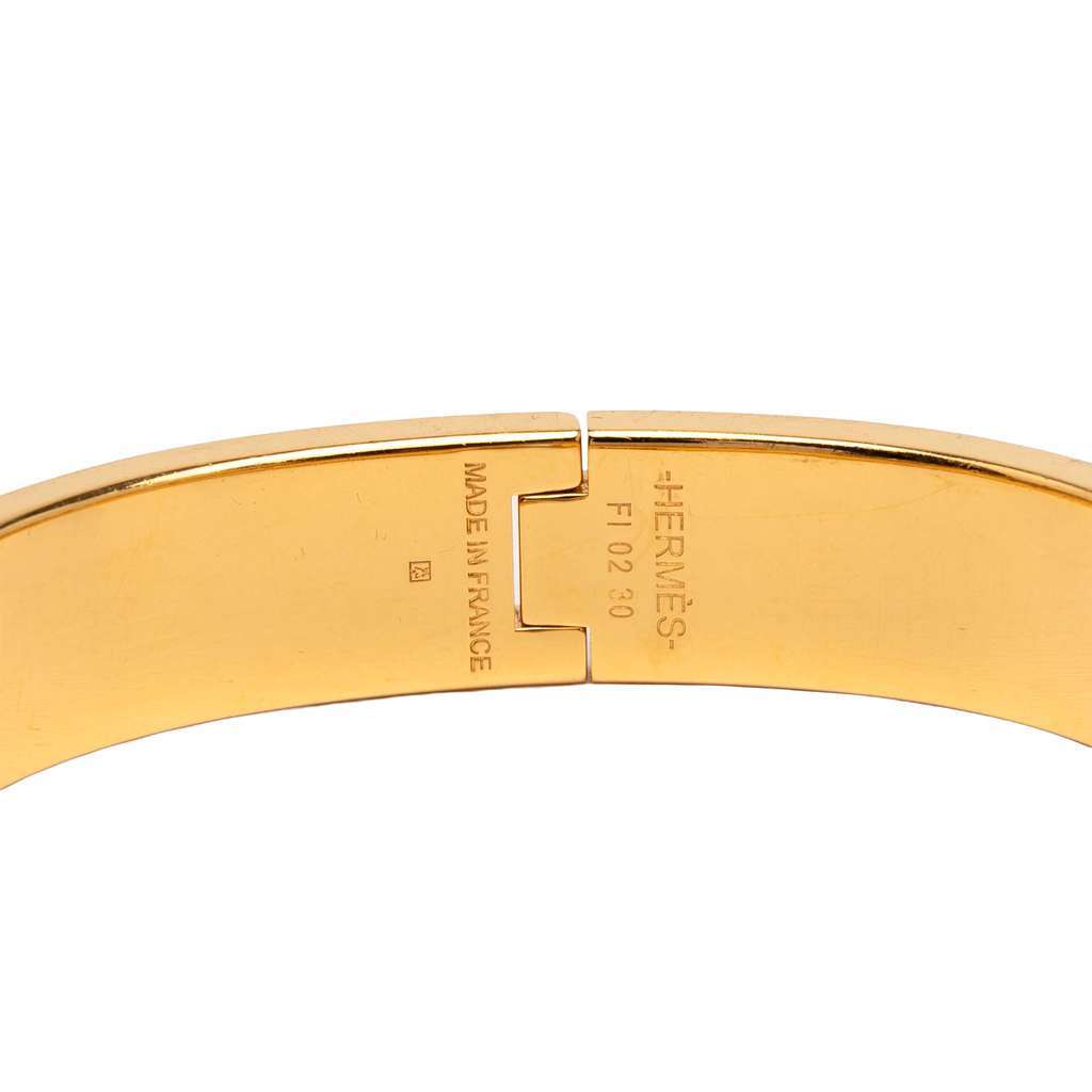 Hermès Narrow Enamel Couvertures et Tenues de Jour Clic H PM Blue Good condition - Model View