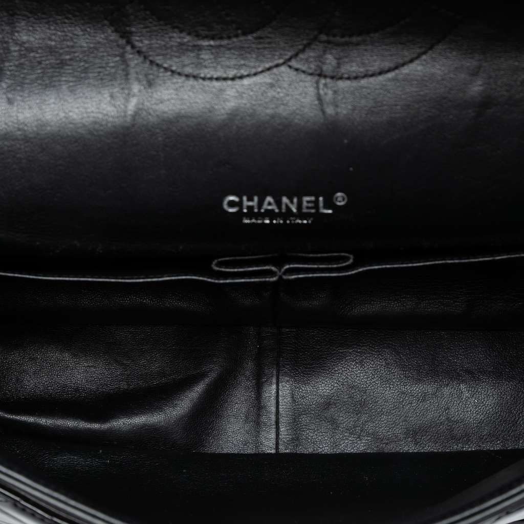 Chanel Maxi Classic Patent Double Flap Black Leather Good - Model View