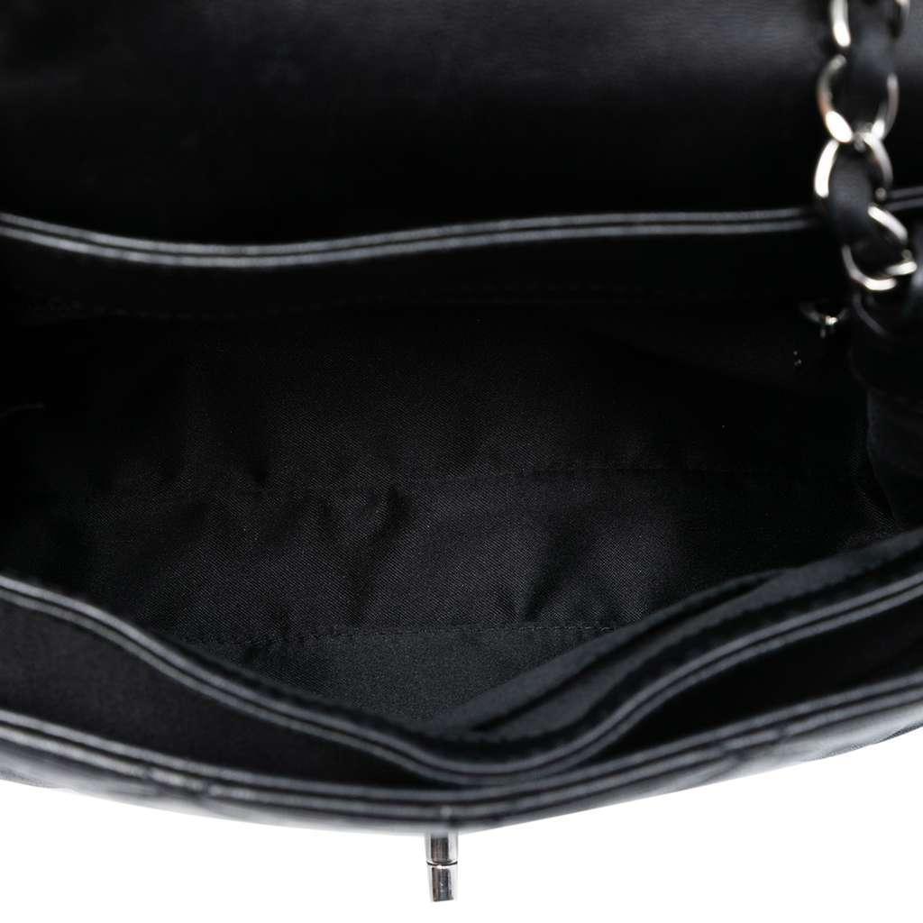 Chanel Small Quilted Lambskin Coco Loop Flap Black Leather Very good condition - Model View