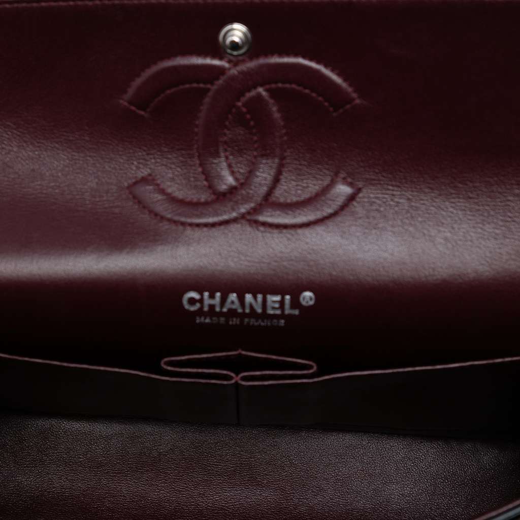 Chanel Medium Classic Lambskin Double Flap Black Leather Good - Model View