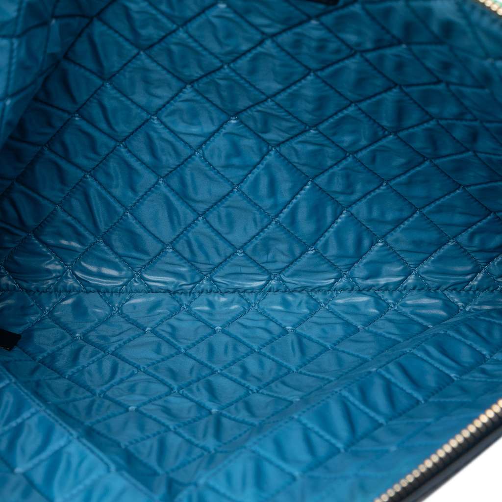 Chanel Large Lambskin Colorblock Patchwork O Case Blue Leather Good - Model View