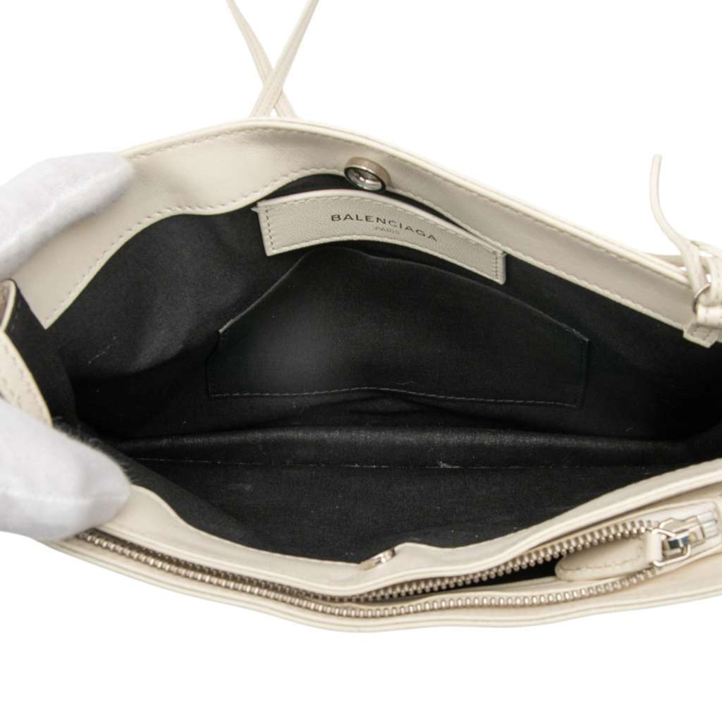 Balenciaga Leather Perforated Logo Navy Pochette Crossbody White Leather Very good - Model View