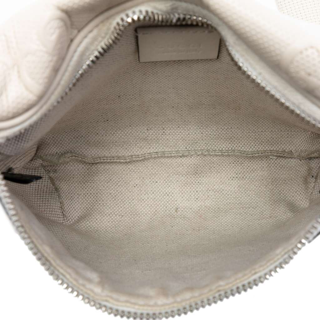 Gucci GG Embossed Perforated Leather Belt Bag White Leather Very good condition - Model View