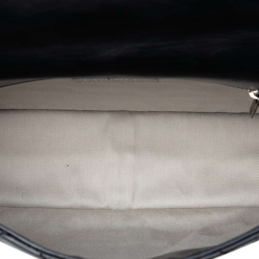 Chanel Embossed CC Quilted Aged Calfskin Reissue 2.55 Single Flap 227 Black Leather Good - Model View