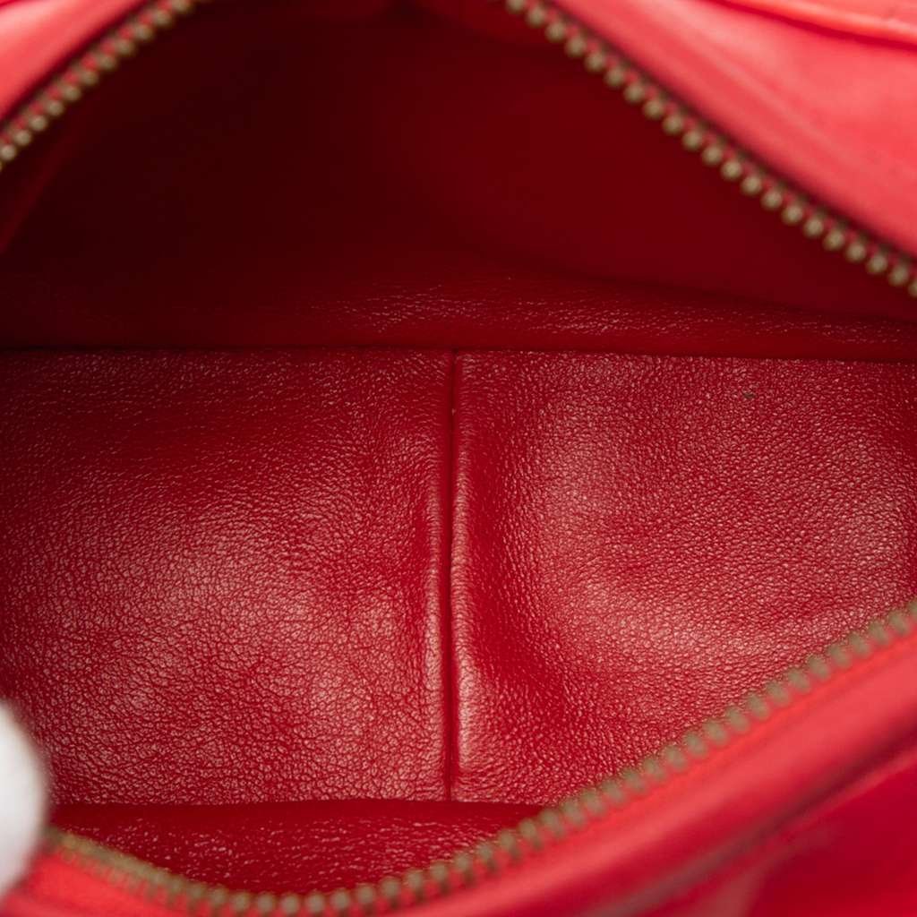 Chanel CC Quilted Lambskin Tassel Camera Bag Red Leather Good - Model View