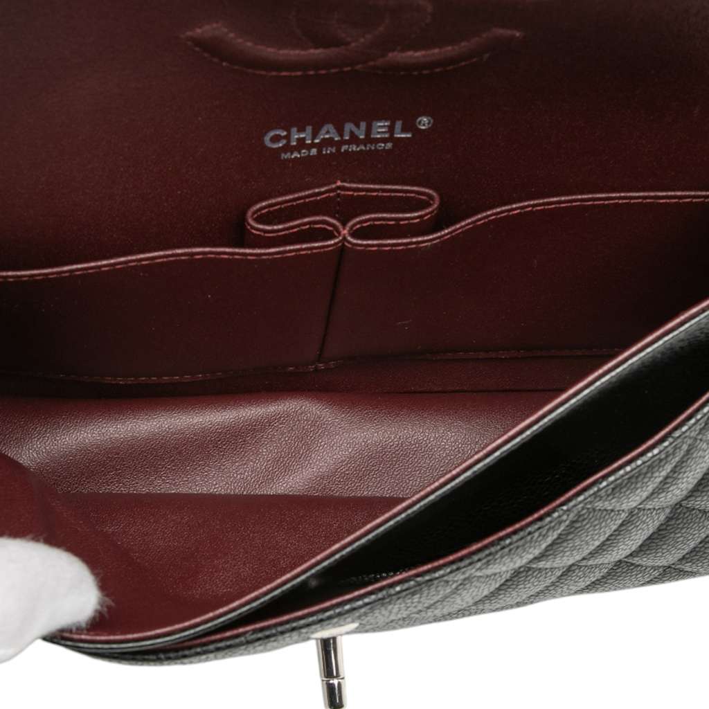 Chanel Medium Classic Caviar Double Flap Black Leather Good - Model View