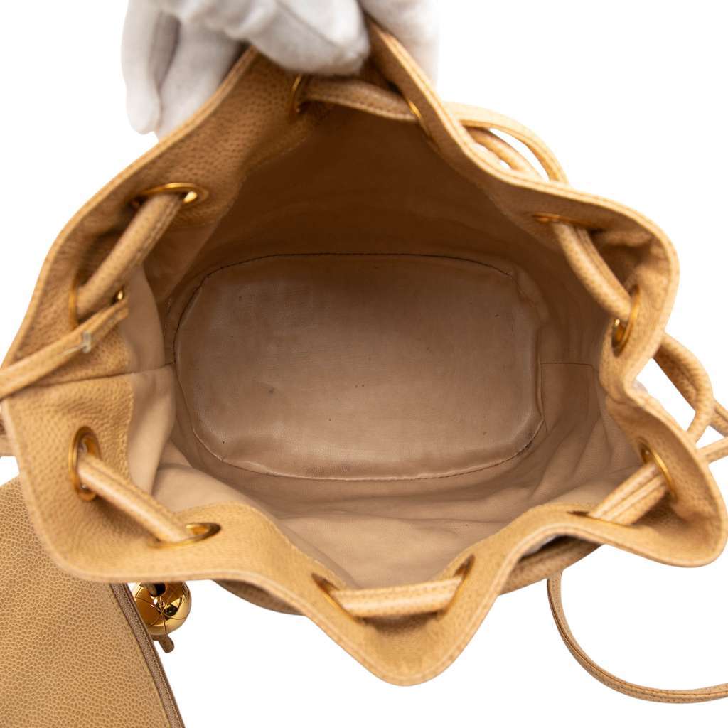 Chanel CC Caviar Drawstring Bucket Bag Brown Leather Good - Model View