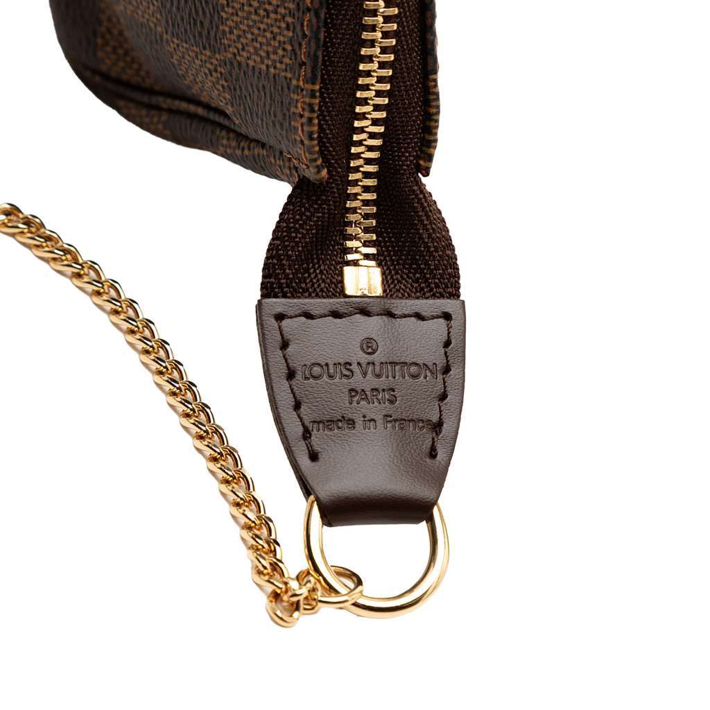 Louis Vuitton Damier Ebene Mini Pochette Accessoires Brown Very good condition - Box View